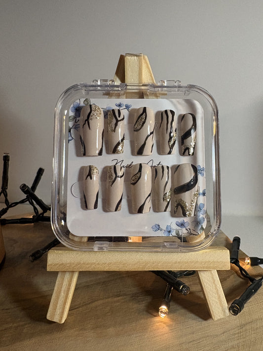 Elégance Marbrée Or Noir