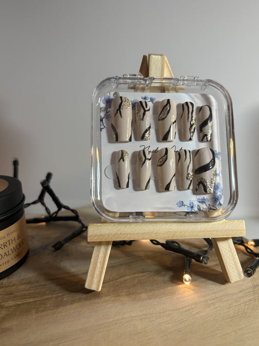 Elégance Marbrée Or Noir